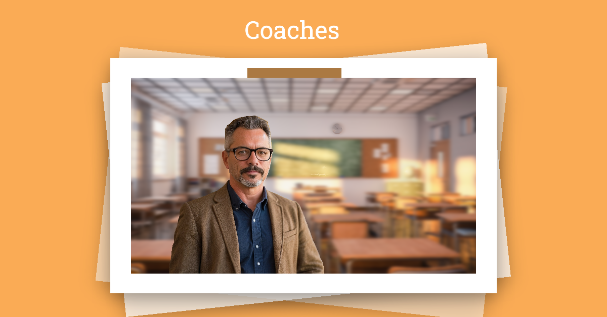 A male coach with glasses and a brown blazer stands in a well-lit classroom. The image is framed with a layered paper effect on an orange background, with the word 'Coaches' displayed at the top.